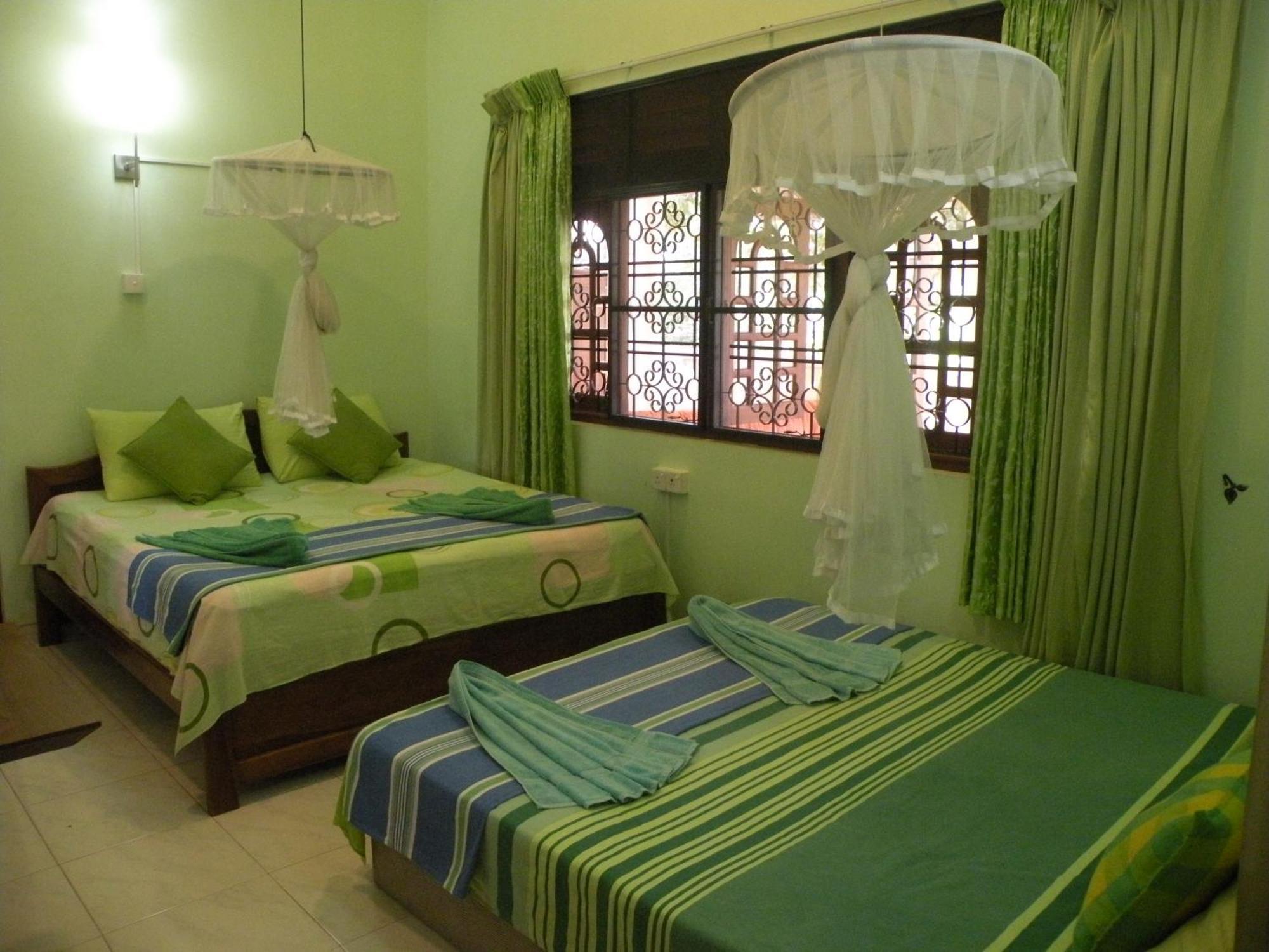 Henderson Airport Residence Negombo Quarto foto